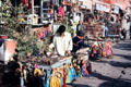 Street scene with vendors selling puppets in Jaipur. India.