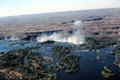 Victoria Falls fall into a long gorge which Zambezi River carved out over time. Zimbabwe.