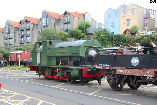 Bristol Harbour Railway steam locomotive pulling passenger car. Bristol, England.