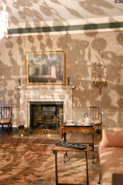 Drawing room with tea table & fireplace at Georgian House Museum. Bristol, England.