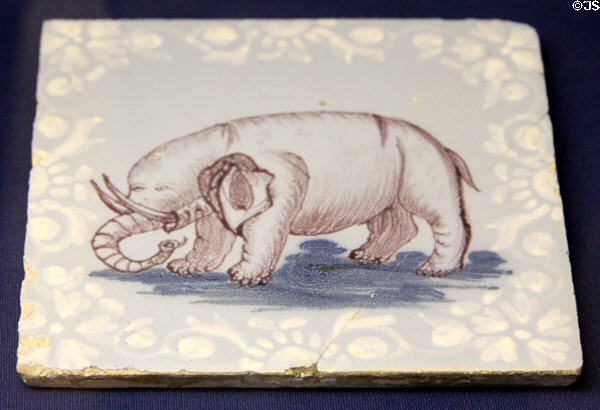 Ceramic tile (1750-75) depicting an artist's concept of an elephant likely taken from a book of prints, probably made in Redcliffe Back Bristol at Bristol Museum & Art Gallery. Bristol, England.