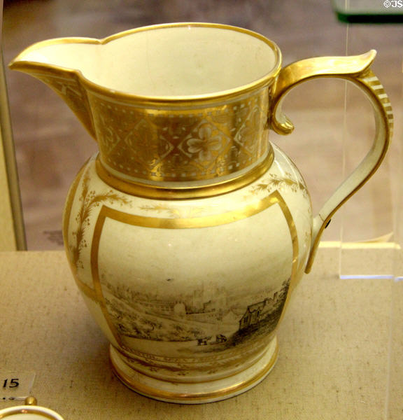 Ceramic jug (c1850) overglaze-painted & gilded, painted on one side with Bristol coat-of-arms & other side with view of Bristol from Clifton Wood, probably a presentation item, made in Worcester at Bristol Museum. Bristol, England.