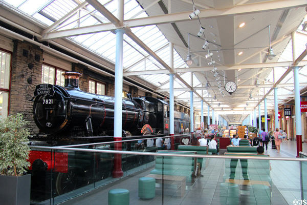 Steam locomotive on display at shopping center adjacent to STEAM Museum of Great Western Railway. Swindon, England.