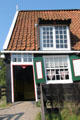 Fisherman's cottage from Marken which typically had an open fire in living room but no chimney, the smoke escaping through a hatch in the roof at Arnhem Openlucht Museum. Arnhem, Netherlands.
