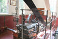 Steam engine power equipment in Veenwouden dairy factory at Arnhem Openlucht Museum. Arnhem, Netherlands.