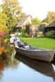Small boats moored along canal. Giethoorn, Netherlands.