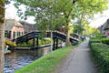 Walkway for strolling the length of main canal. Giethoorn, Netherlands.