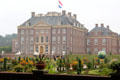 Het Loo Palace viewed in the morning mist from formal gardens. Het Loo, Netherlands.