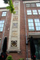 Brick building with ornate panels. Zwolle, Netherlands.