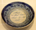 Stoneware dish with Dutch script in the center ANNO Stadsmuseum Zwolle. Zwolle, Netherlands.
