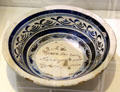 Stoneware bowl with Dutch script in the center at ANNO Stadsmuseum Zwolle. Zwolle, Netherlands.