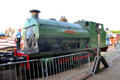 Volunteer worker inspecting Henbury's saddleback engine. Bristol, England.