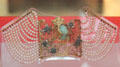 Pearls & collar plaque in Art Nouveau style by René Lalique at Bristol Museum & Art Gallery. Bristol, England.