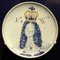 Ceramic plate depicting King William III who ruled jointly with Queen Mary II, having replaced the Catholic King James II after he was deposed, made in Brislington, at Bristol Museum & Art Gallery. Bristol, England.