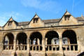 Side view of arches & gables of historic market hall. Chipping Campden, England.
