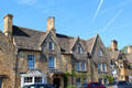Vintage Cotswold stone row houses on High St. Chipping Campden, England.